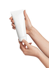 Human hands holding a blank white cosmetic tube ready to open, minimalist studio shot for skincare and beauty product mockups, unbranded packaging on clean background