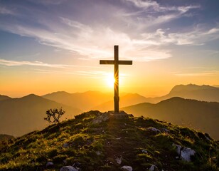 Wooden cross atop a hill at sunset, silhouetted against the sky