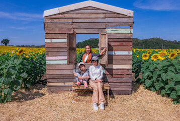 Family Posing in Sunflower Field, Thailand