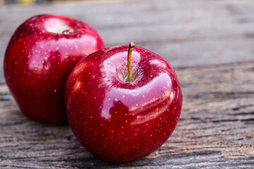 Fresh red apple on wood dark style