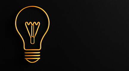 Gold Outline of Lightbulb on Black Texture