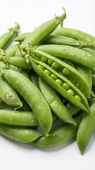 freshly picked vivid green sugar snap peas stacked open pod revealing many round seeds