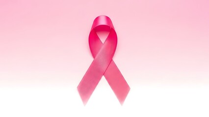 Pink ribbon symbolizing breast cancer awareness on gradient background