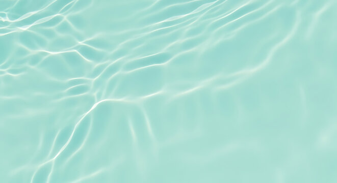 Subtle Ripples in Light Blue Water with Gentle Caustics Creating Calm and Serene Abstract Background under Natural Sunlight