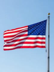 Obraz premium United States Flag Waving Against Clear Sky