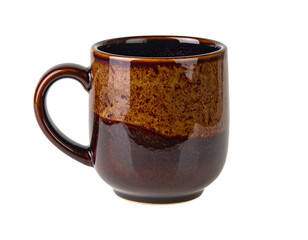 A close-up studio shot shows a ceramic coffee mug with a dark brown glaze