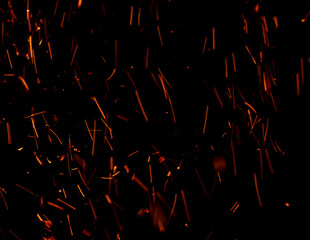 A black background with a lot of fire and smoke