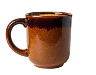 Close-up of a brown ceramic mug filled with a dark liquid against a black background