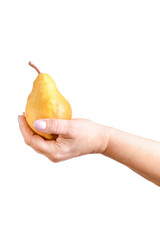 A female hand holding a ripe yellow pear isolated on a white background.