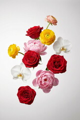 Flowers background. Bright colors flying flowers  close up. Copy space. Holiday backdrop, product presentation display.