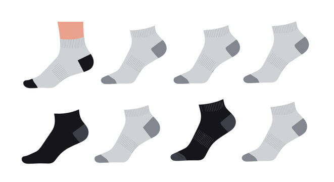 Multiple pairs of ankle length socks in various shades of gray and black with one shown on a human foot.
