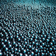 A detailed view of numerous shiny metallic blue spheres creating a mesmerizing abstract texture.