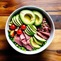 A vibrant poke bowl featuring fresh avocado slices, tuna pieces, cherry tomatoes, and vegetables on a wooden table.