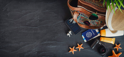 Adventure Travel Concept on Black Stone Background