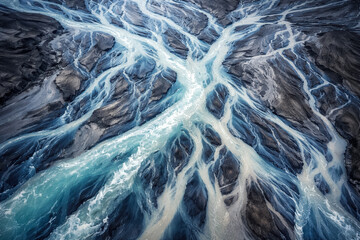 image.pnAerial view of braided glacial rivers forming abstract blue patterns across dark sediment, dramatic geology and climate change concept background, generative AIg