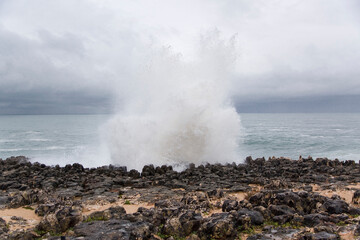 Powerful Atlantic Ocean Waves Crashing on Rugged Coastal Rocks