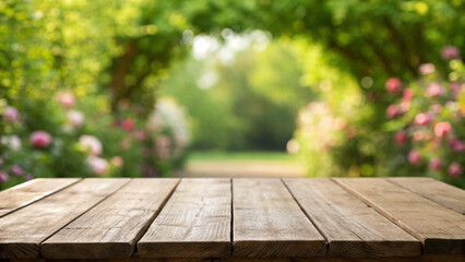 Wood table in garden surrounded by greenery and flowers for displaying products