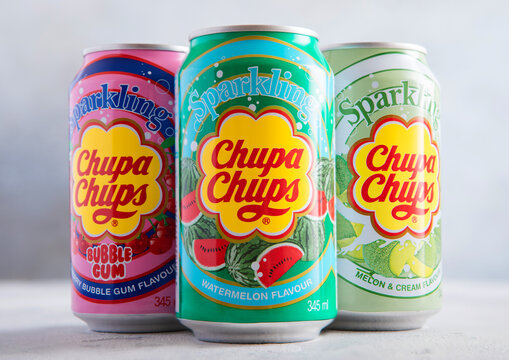 LONDON,UK - NOVEMBER 25, 2025 : Various flavor Sour Sparkling Chupa Chups soda soft drink on light table background.