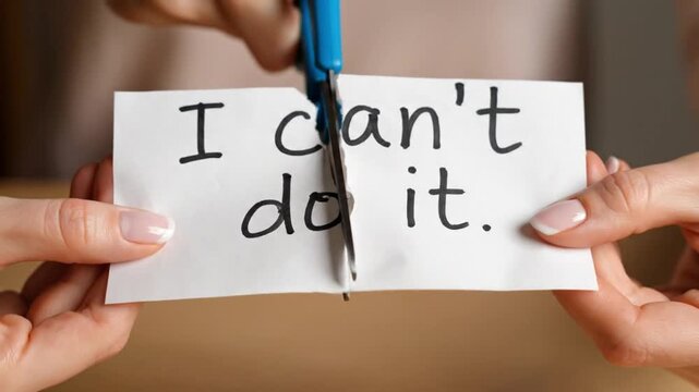 Woman cuts I can not do it paper with scissors, transforming doubt into empowerment perfect for motivation, mindset, and personal growth content.