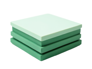 A stack of four green foam blocks on top of each other, suitable for DIY projects or photography props