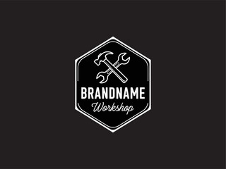 Obraz premium White crossed hammer and wrench logo design.