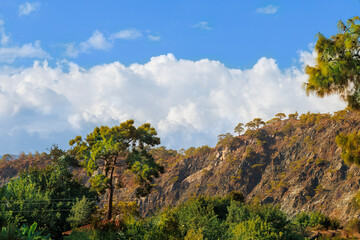 
Scenic mountains, pine forests, sandy beaches, turquoise sea, bays, coves, Taurus Mountains views, Mediterranean coastline, nature reserve, ecological park, Wild beaches, gray sand shore