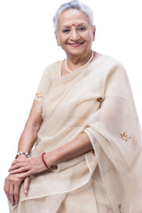 Portrait of smiling senior woman in traditional Indian sari