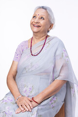Portrait of beautiful senior woman on white background