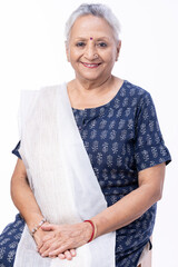 Portrait of beautiful senior woman on white background