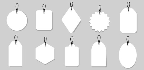 Set blank white paper price tags or gift tags. Paper labels with cord. Set template shopping labels with shadow - stock vector. 