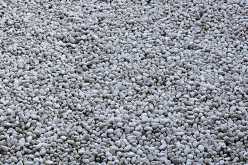 A natural collection of light, smooth pebbles, perfect for landscaping, garden features, aquarium decor, and textured backgrounds or wallpapers.