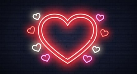 Vibrant neon heart sign on dark brick wall with glowing red and pink lights