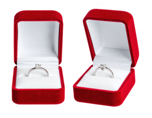 Engagement ring box positioned for proposal day or valentines day, isolated on white and transparent.