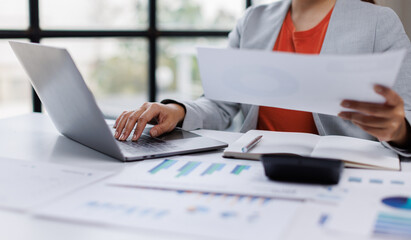 Accounting company provide finance and taxation planning for profitable cash flow, accountant working in office, analyze financial data and accounting record with calculator.Insight
