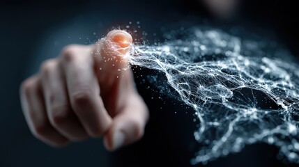 Hand touching glowing map with lines showing data connections in a dark background and light effects during a technology presentation