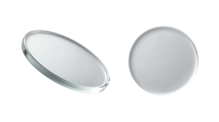 Two clear contact lenses viewed from an angle