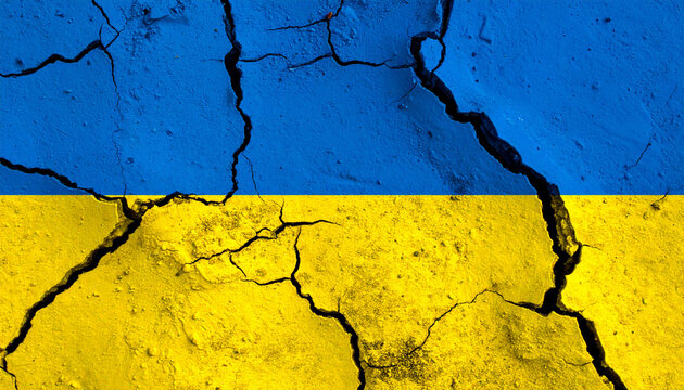 Cracked Ukraine flag on concrete wall texture, blue and yellow distressed background