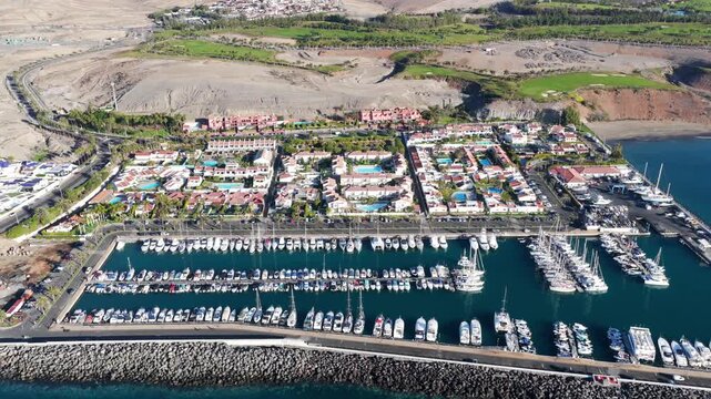 Aerial of Meloneras Golf Course and Pasito Blanco Private Marina, Featuring Luxury Yacht Berths and Frontline Villa Estates, Gran Canaria, Spain
