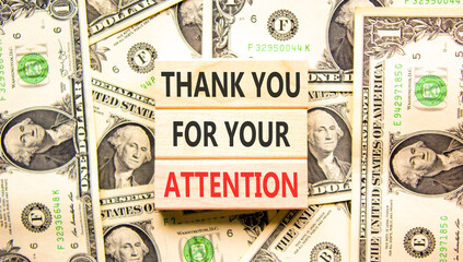 Thank you for your attention symbol. Concept words Thank you for your attention on beautiful wooden blocks. Beautiful dollar bills background. Business thank you for your attention concept. Copy space