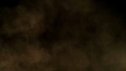 Fototapeta premium Freeze Motion Shot of Flying Sand Dust , Isolated on Black Background