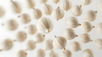 White Sorghum Grains Floating on a Bright Background with Depth of Field