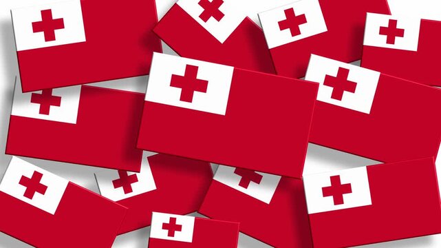 Pile of Tonga flags scattered randomly on a white background