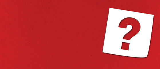Note paper with question mark on panoramic red banner background