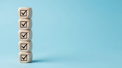 Stack of wooden blocks with checkmarks standing upright on blue