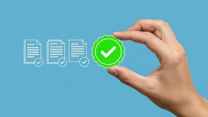 Hand holding green checkmark icon with documents on blue background