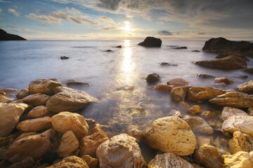 Beautiful seascape of calm sea at sunset.