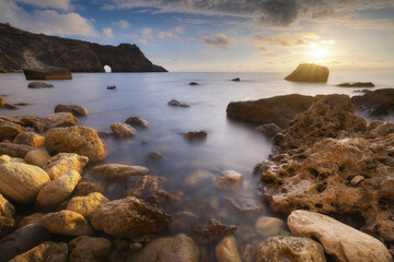 Beautiful seascape of calm sea at sunset.