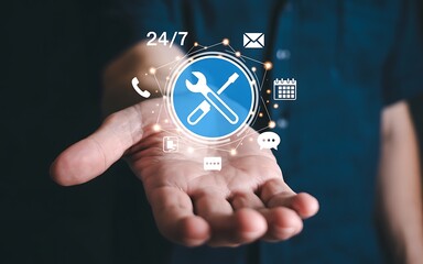 Hand holding virtual tech support icons