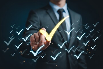 Businessman holding a large checkmark symbol