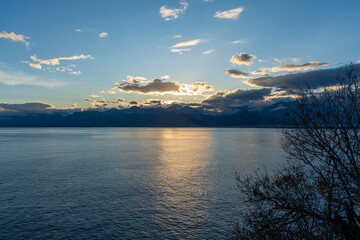Clouds over the Taurus Mountains at sunset and beutiful reflection on the sea